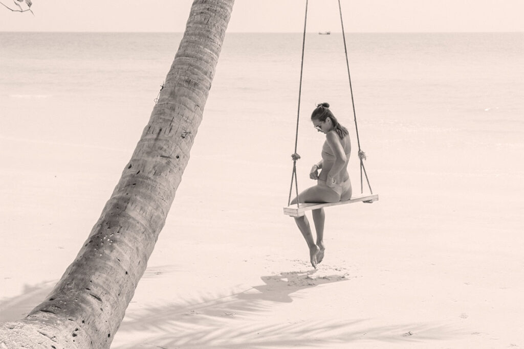 Woman enjoying beach in bikini