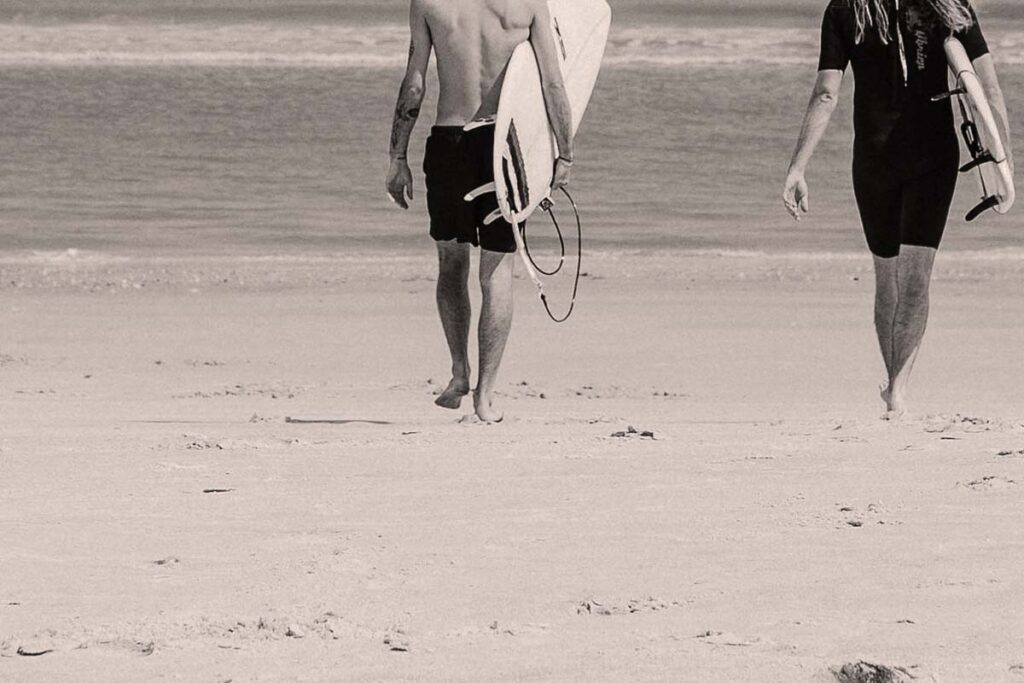 Surfboards Men At The Beach
